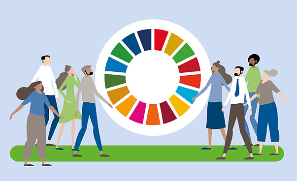 eine Grafik zeigt ein Rad, das die 17 globalen Nachhaltigkeitsziele symbolisiert. Links und rechts davon stehen jeweils drei gezeichnete Personen.
